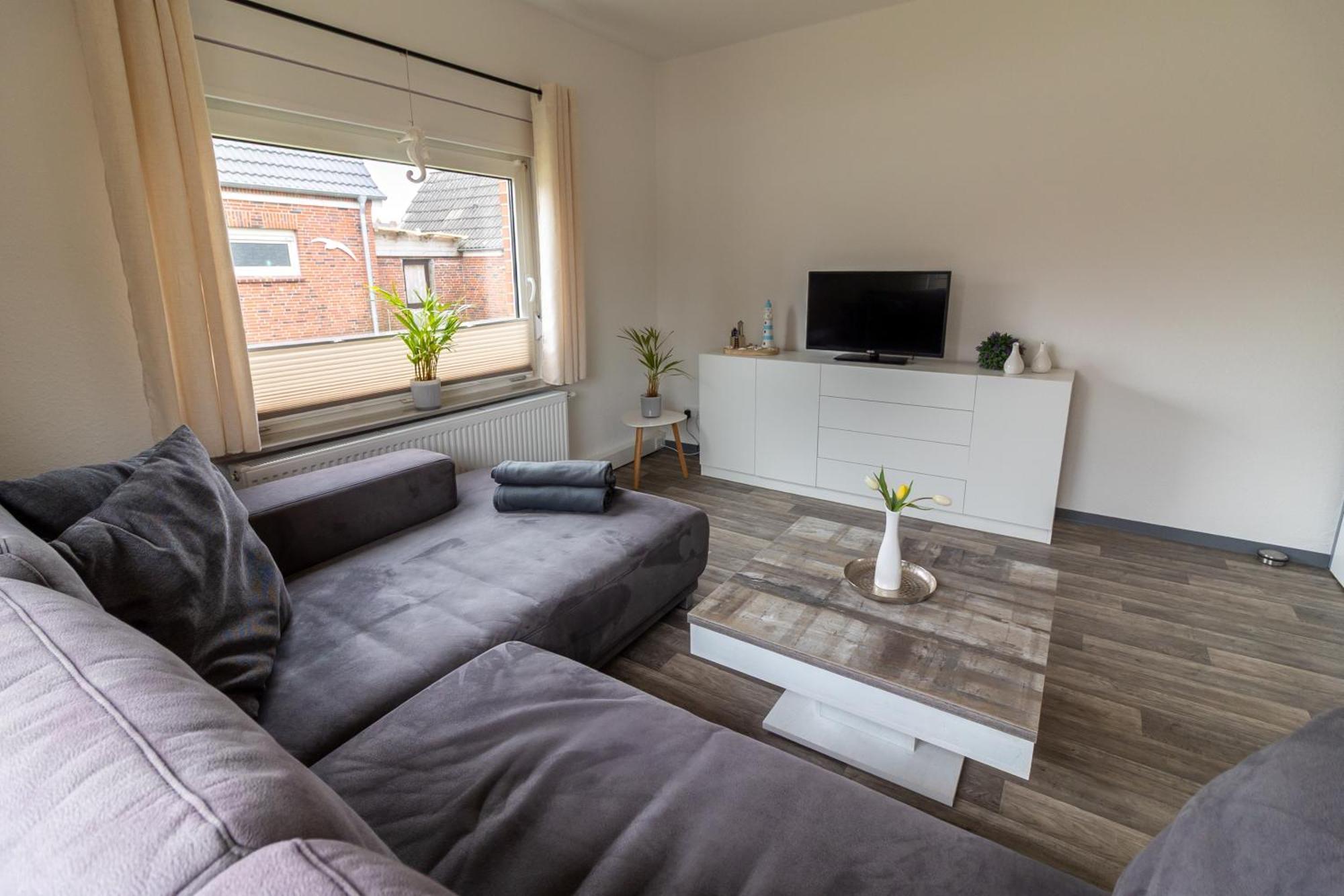 Ferienwohnung Ant Dopke Krummhörn Buitenkant foto