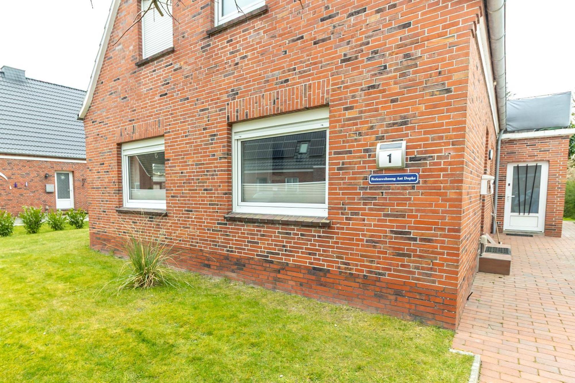 Ferienwohnung Ant Dopke Krummhörn Buitenkant foto