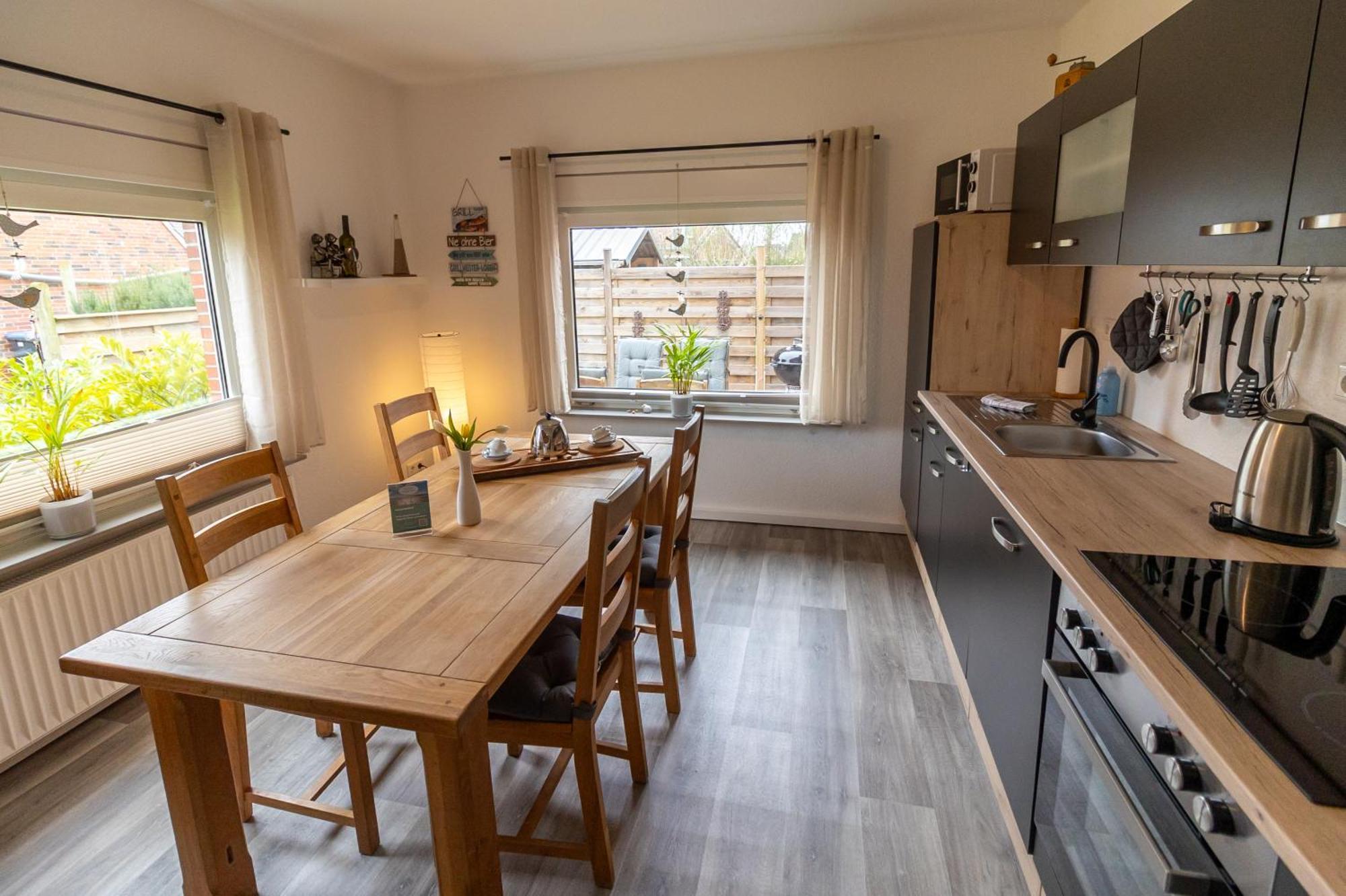 Ferienwohnung Ant Dopke Krummhörn Buitenkant foto