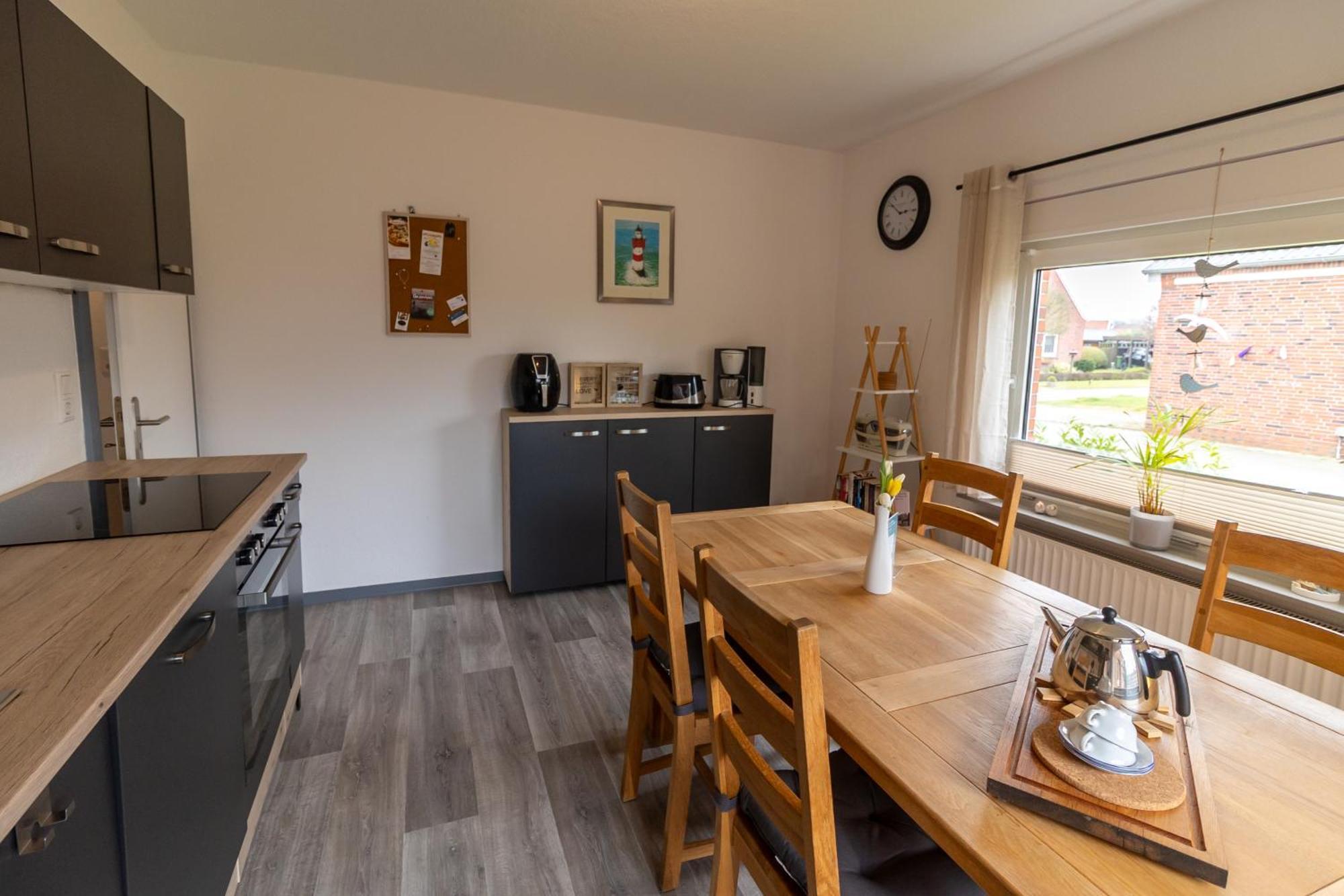 Ferienwohnung Ant Dopke Krummhörn Buitenkant foto