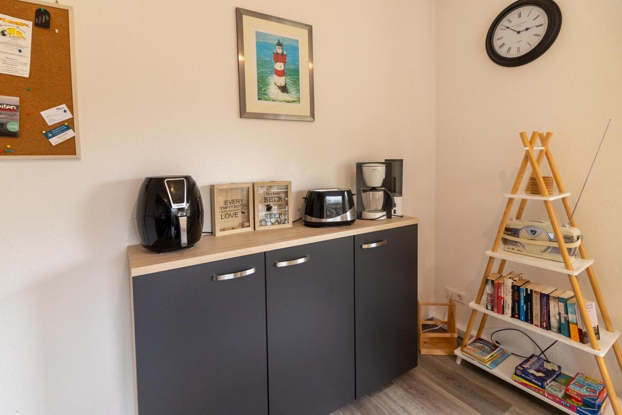 Ferienwohnung Ant Dopke Krummhörn Buitenkant foto
